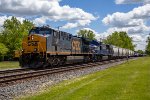 CSX 7415 leads a manifest north on the Saginaw Sub